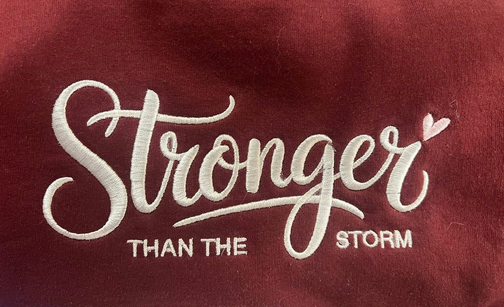 Stronger Than the Storm Embroidered Sweatshirt